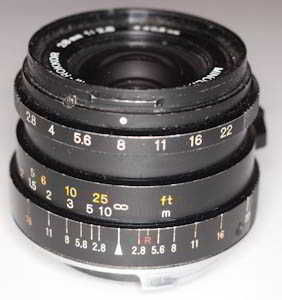 Minolta M-Rokkor 28mm f/2.8 M 35mm interchangeable lens