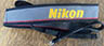 Nikon Vintage Grey with Black Red Stripes 10.00